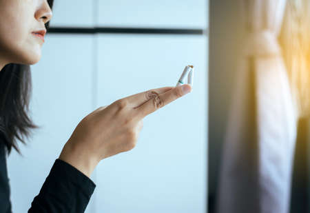 Concept no smoking day world quitting world no tobacco in 31 may day,Woman hands destroying or crushing cigaretteの写真素材