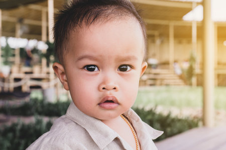 Portrait of adorable asian baby boy at outdoor,Cute newborn kid