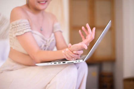 Woman suffering from numbness on wrist,Numbing pain in hand