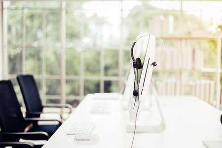 Close up of headset for call center worker or employees people working at officeの写真素材