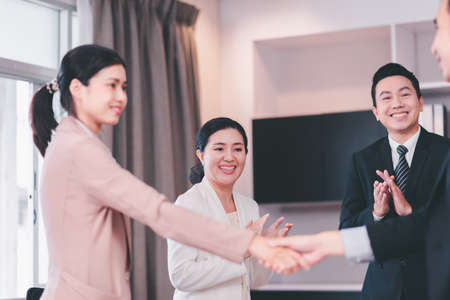 Business people hands clapping after meeting,Group of success presentation and coaching seminar at officeの写真素材