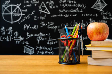 Education background concept. Stationery in holder color pencil, compasses tool, scissors, rulers,...