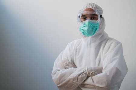 Medical staff wearing face shield and medical mask for protect coronavirus covid-19 and PPE suit for Coronavirus outbreak or Covid-19.の写真素材