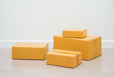 Stacking of box parcel cardboard mock up on blank space white background.の写真素材