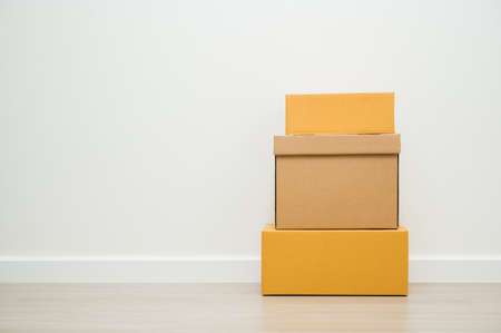 Stacking of box parcel cardboard mock up on blank space white background.の写真素材