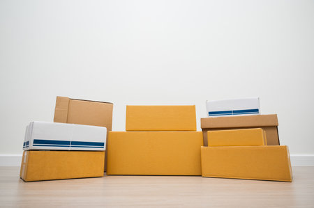 Stacking of box parcel cardboard mock up on blank space white background.の写真素材