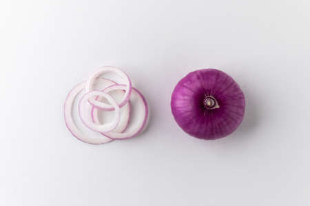 Whole Red onion Sliced in different ways and arranging. Top view Garnish and food ingredients on isolated white background.の写真素材