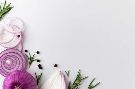 Garnish and food ingredients Black pepper Rosemary Garlic cloves and pieces of raw garlic on isolated white background. Top view Garlic bulbs with blank space.の写真素材