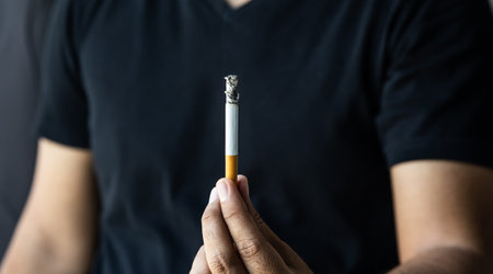 A young man with a cigarette He is going to smokeの写真素材