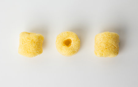 Crispy Corn rings salty snacks. Fast food or junk food snacks unhealthy concept.の写真素材