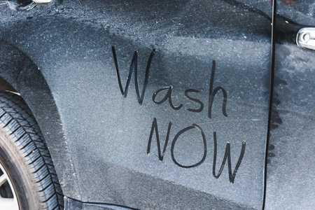The cars are dirty, dirty, mud and dust. It has a message saying Wash nowの写真素材