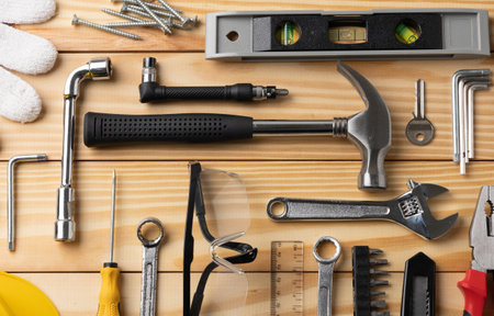 All tools supplies home construction on the wooden table background. Building tool repair equipments.の写真素材