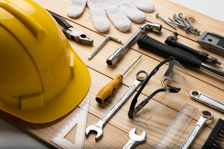 All tools supplies home construction on the wooden table background. Building tool repair...