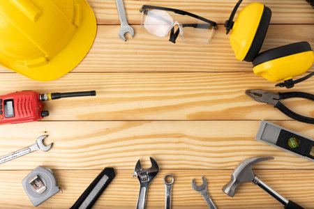 All tools supplies home construction on the wooden table background. Building tool repair...