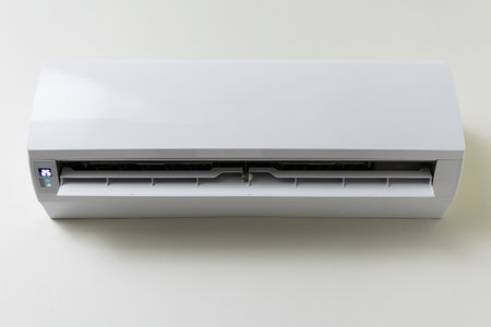 The air conditioner is hung on the wall of the house. For cooling in the living room of the house Make the air coolの写真素材