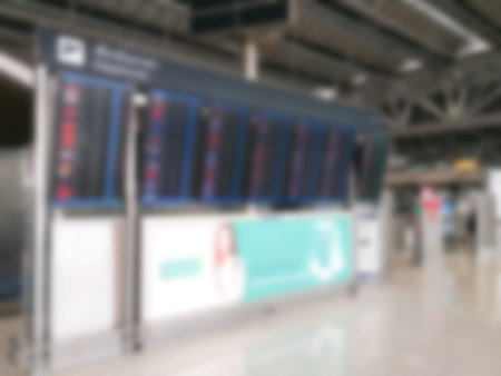 Abstract blurring image of airport terminal background. Travel passenger departure and arrival hall.の写真素材