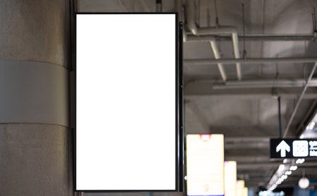 Blank screen advertise mockup in the airport terminal. Display for billboard ad in the building. Poster media template.の写真素材