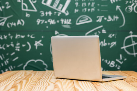 Education background concept. Laptop with Mathematical formula chalkboard. Banner design copy space.の写真素材