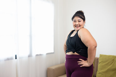 Smiling young asian women plus size standing pose looking camera. Happy lifestyle and proud herself....