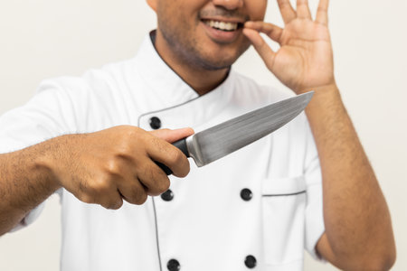 Close up male hands chef holding chef knife various gesture action on isolated white background....