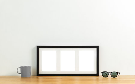 Style picture frame still life put on the wooden table. Blank space empty picture frame with mockup....