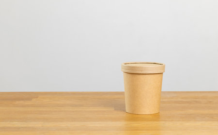 Eco friendly food packaging. Paper recycling zero waste natural products. A box of paper for food disposable catering of nature and recycling concept. Plastic free set on background.の写真素材