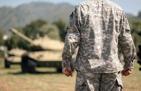 Asian man special forces soldier standing against on the field Mission. Commander Army soldier...