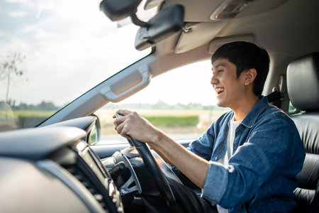 Young handsome asian man getting the new car. He hugged his car and was very happy touching detail interior . Buy or rent car concept.の写真素材