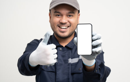 Technician workers in uniform maintenance service with smartphone. Profession of service industry...