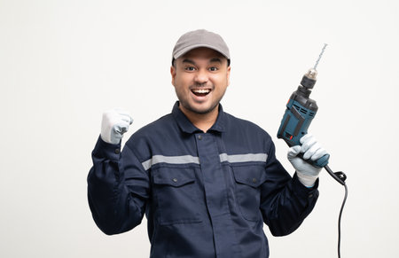 Technician workers in uniform maintenance service with equipment tools box and drill. Profession of service industry house repair. Home services isolated background.の写真素材