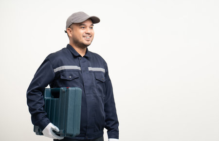 Technician workers in uniform maintenance service with equipment tools box. Profession of service industry house repair. Home services isolated background.の写真素材