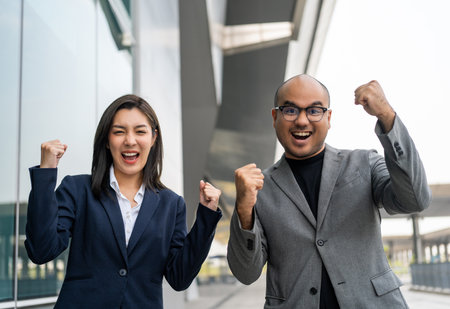 Asian business people team analyzing statistics financial. Team of businesspeople man and woman...