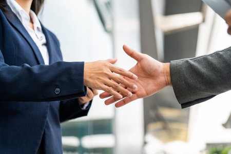 Asian business people team analyzing statistics financial. Team of businesspeople man and woman Meeting Conference Discussion Corporate Concept in office.の写真素材