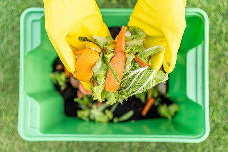 Ecology compost supply Kitchen waste recycling composter environmentally friendly. The young man...