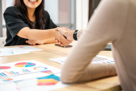 Asian business start up freelance people team analyzing statistics financial. Group Team of businesspeople man and woman Meeting Conference Discussion various topic Corporate Concept in office.の写真素材