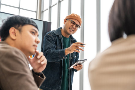 Asian business start up freelance people team analyzing statistics financial. Group Team of businesspeople man and woman Meeting Conference Discussion various topic Corporate Concept in office.の写真素材