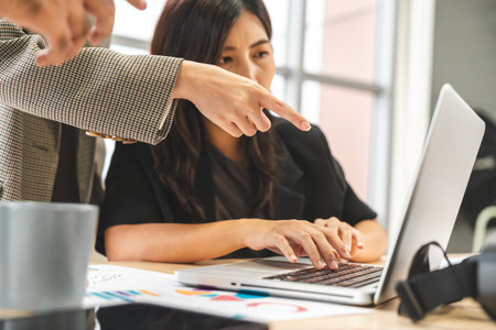 Asian business start up freelance people team analyzing statistics financial. Group Team of businesspeople man and woman Meeting Conference Discussion various topic Corporate Concept in office.の写真素材