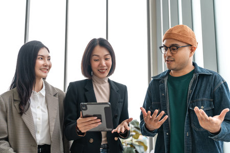 Asian business start up freelance people team analyzing statistics financial. Group Team of...