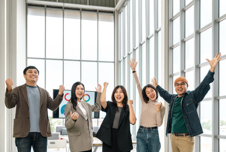 Asian business start up freelance people team analyzing statistics financial. Group Team of businesspeople man and woman Meeting Conference Discussion various topic Corporate Concept in office.の写真素材