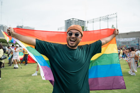LGBTQ gay celebration moment on Pride month Parade of LGBT community festival. Bisexual man gay...