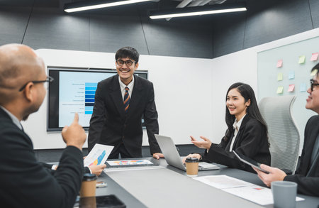 Asian business people team analyzing statistics financial. Group Team of ceo business man and woman...