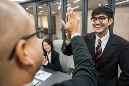 Asian business people team analyzing statistics financial. Group Team of ceo business man and woman Meeting Conference Discussion various topic. Executive professional managers Corporate in office.の写真素材