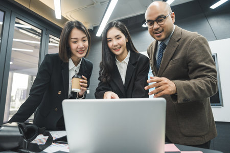 Asian business people team analyzing statistics financial. Group Team of ceo business man and woman Meeting Conference Discussion various topic. Executive professional managers Corporate in office.の写真素材