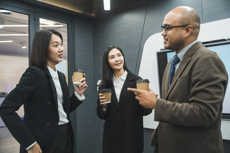 Asian business people team analyzing statistics financial. Group Team of ceo business man and woman Meeting Conference Discussion various topic. Executive professional managers Corporate in office.の写真素材