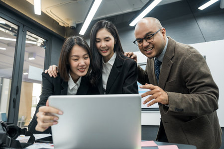 Asian business people team analyzing statistics financial. Group Team of ceo business man and woman Meeting Conference Discussion various topic. Executive professional managers Corporate in office.の写真素材