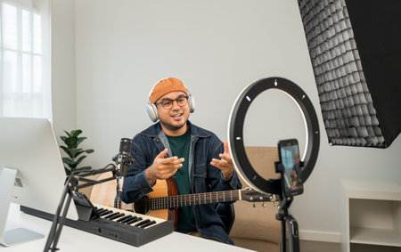 Professional Musician with condenser microphone and tablet for Mixing Mastering music. Music...