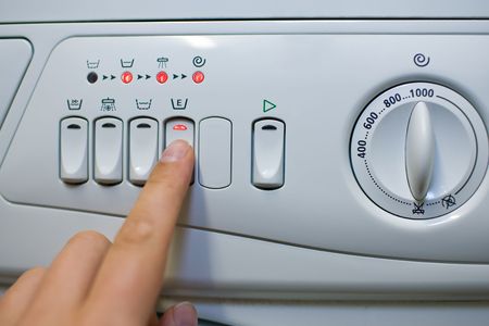 Panel of a white washing-machine.の写真素材