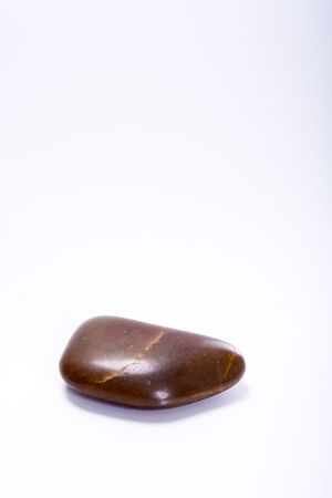 Brown, polished, shiny Pebble. Zen-Stone.の写真素材