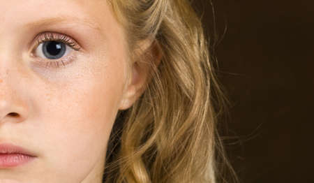 Young girl looking seriousの写真素材