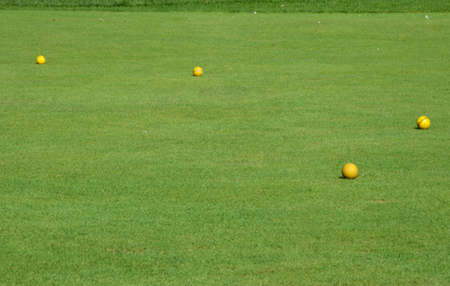 golf terrain with four ballsの写真素材